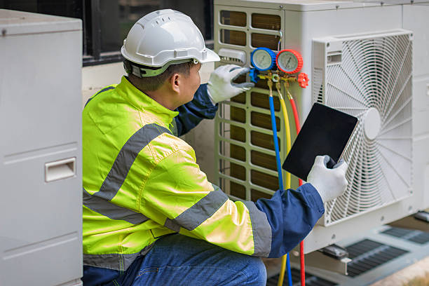 Professional Hvac Maintenance technician working in Malone, FL